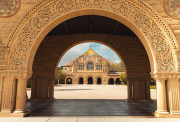 church facade appearing through an archway