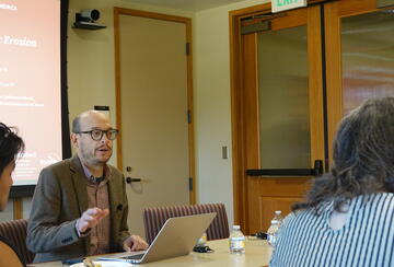 Alberto Vergara addresses a largely student audience at Stanford during his talk on democratic hollowing on May 15, 2026.