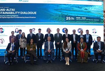 Panelists gather for a group photo. 