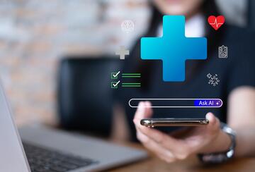 a person holding a phone at a desk with a laptop with ai and health-related images overlayed
