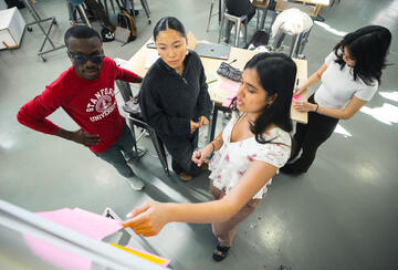 students gathered to brainstorm