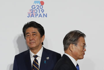 Japan Prime Minister Shinzo Abe and South Korea President Moon Jae-In