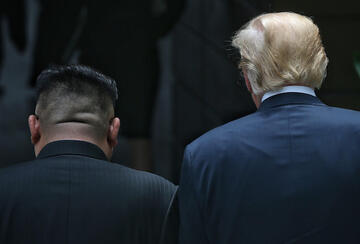 Trump and Kim with Backs to Camera