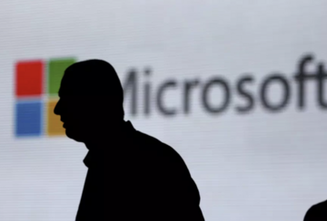 Outline of person in front of Microsoft Logo
