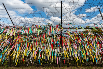 Brightly colored ribbons tied to fences around Imjingak Village in the DMZ on the North Korean Border.