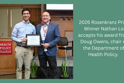 Nathan Lo accepts 2026 Rosenkranz Prize from Doug Owens
