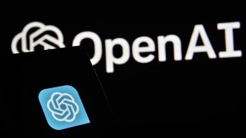 A phone screen showing the logo for Open AI