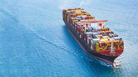 Shipping container on open sea