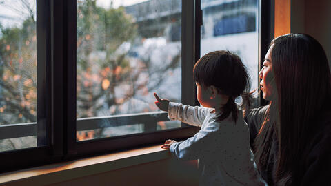 Feature figure showing woman and child in China