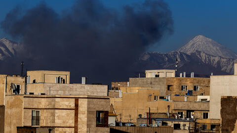 Smoke rises over buildings on March 3, 2026, in Tehran, Iran.