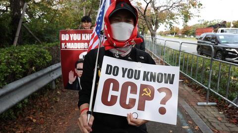 Anti-China and pro-U.S. protesters rally near Gimhae International Airport on October 30, 2025, in Busan, South Korea. 