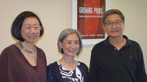 A Global Affiliate Visiting Fellow posing for the camera with APARC faculty Jean Oi and Xueguang Zhou.