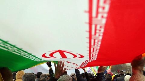 hands on Iranian flag