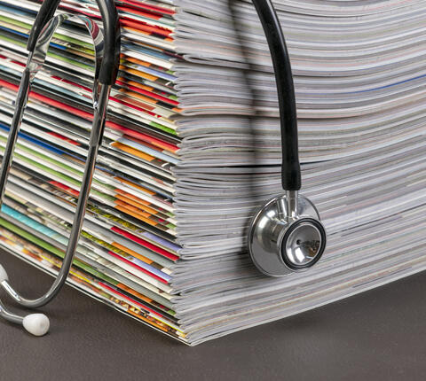 Photo of journals with a stethoscope 