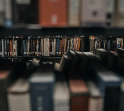 Books on a bookshelf in a library
