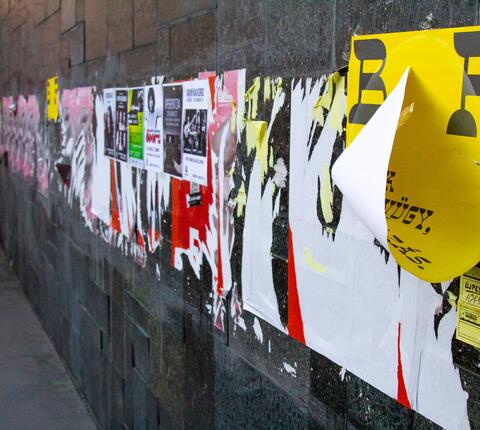 Wall with colored posters