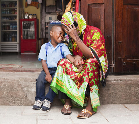 African mother and child sharing a laugh