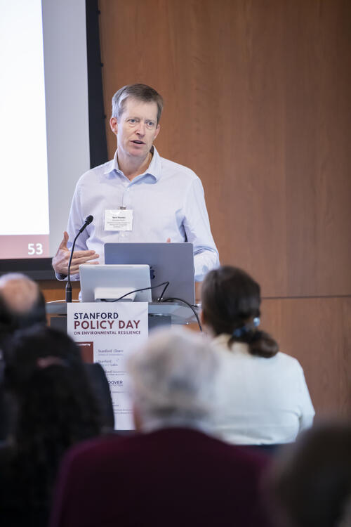 Mark Thurber presents at lectern