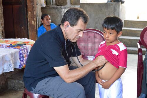 Dr. Paul Wise gives an examine to a Guatemalan boy on March 22, 2016. wise guatemala