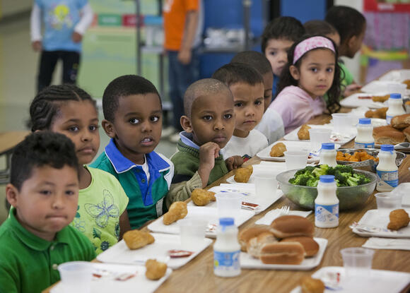 Students sit for school lunch at an elementary school in Silver Spring, Maryland. | Getty Images
