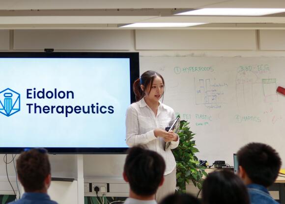 a person giving a presentation in a classroom