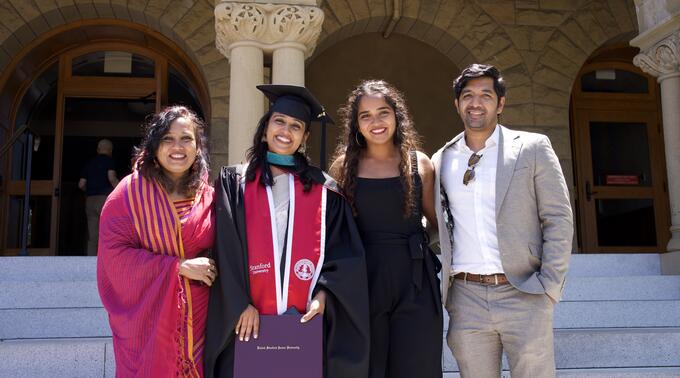 Sakeena Razick with her family on the steps of Encina Hall at Stanford University