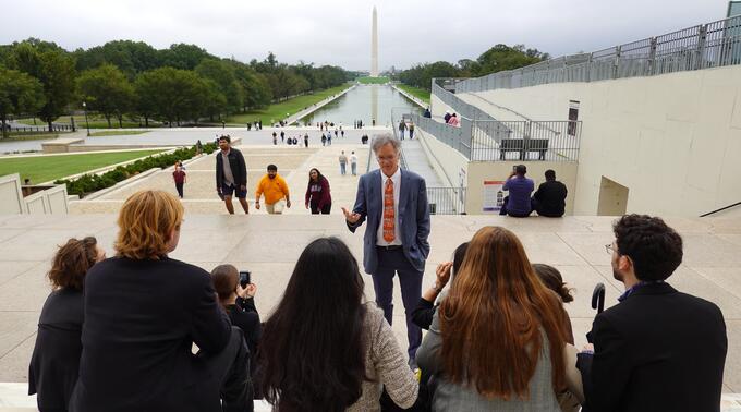 Professor Stedman leads a discussion with the students on the steps of the Lincoln Memorial.
