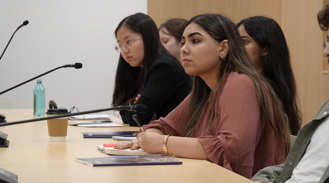 Zoya Fasihuddin takes notes during a site visit to the Carnegie Endowment for International Peace.