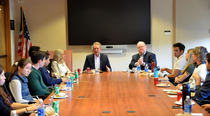 Jeff Flake, former senator and ambassador to Turkiye, engages with students students during a lunchtime discussion