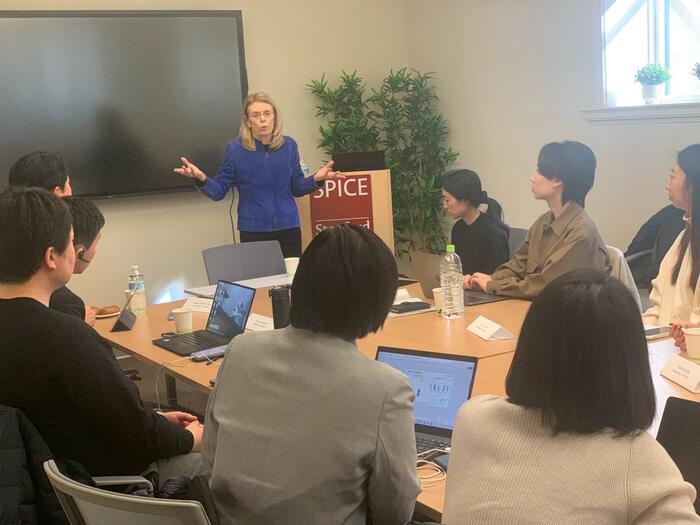 students listening to a lecture in a classroom