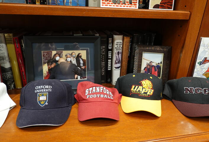 A Stanford Football cap is displayed in the Senator's office.