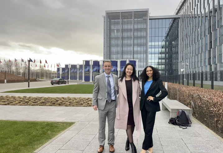 Brian Slamkowski, Angela Chen, and Francesca Bentley at NATO's headquarters in Brussels, Belgium