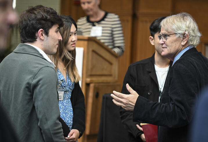 Scott Rozelle speaks with students int he audience.