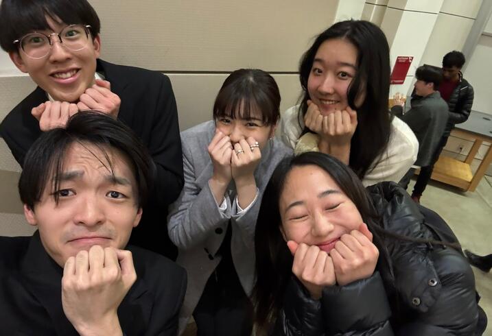 Five students from the Stanford Japan Exchange Conference pose together.
