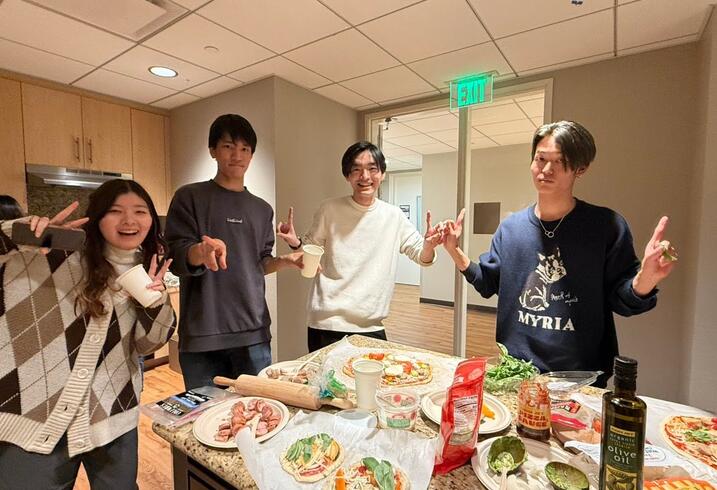 Students from the Stanford Japan Exchange Conference share food together during a cultural exchange event.