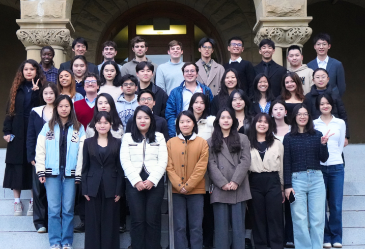 A group photo of the Forum for American-Chinese Exchange at Stanford on the front steps of Eninca Hall.