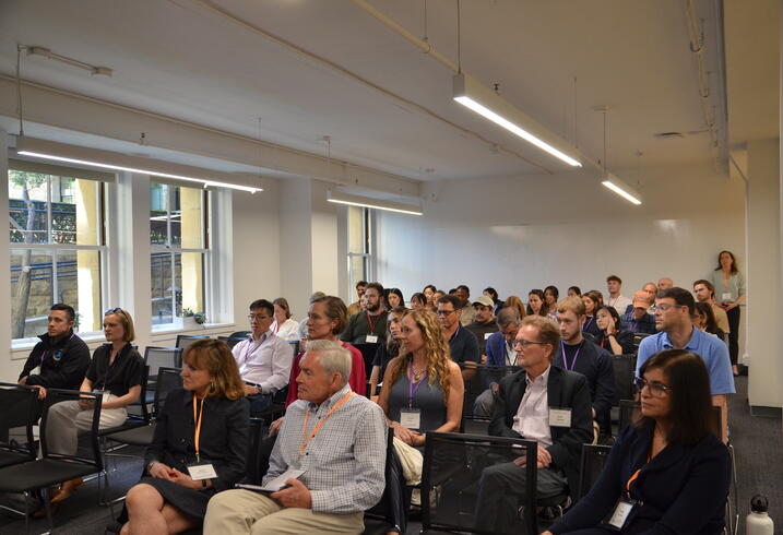 FSI scholars and alumni of the Ford Dorsey Master's in International Policy program listen to a panel discussion at the Freeman Spogli Institute for International Studies.