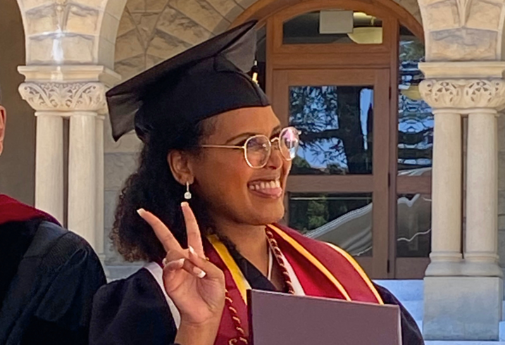 Samara Nassor poses for a candid photo in her graduation cap and gown during the diploma awarding ceremony of the Ford Dorsey Master's in International Poliy.