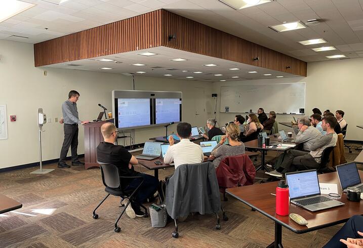 Mark Thurber teaches in front of CPUC staff