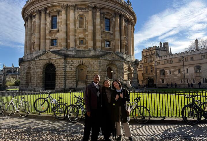 MIP students Tyler Smith, Malou van Draanen Glismann, and Shin Haeng Lee at the Radcliffe Camera at Oxford.