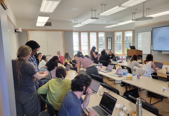 Students working in groups in a classroom