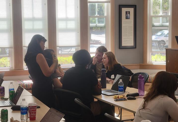 Students talking around a table