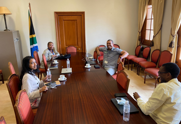 Janani Mohan and Eli MacKinnon meet with stakeholders in South Africa