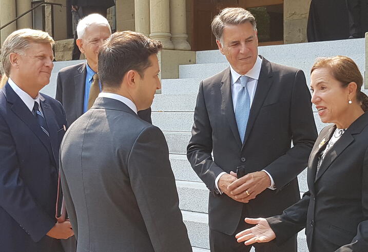 President Volodymyr Zelenskyy of Ukraine speaks with Markos Kounalakis and Lieutenant Governor Eleni Kounalakis.