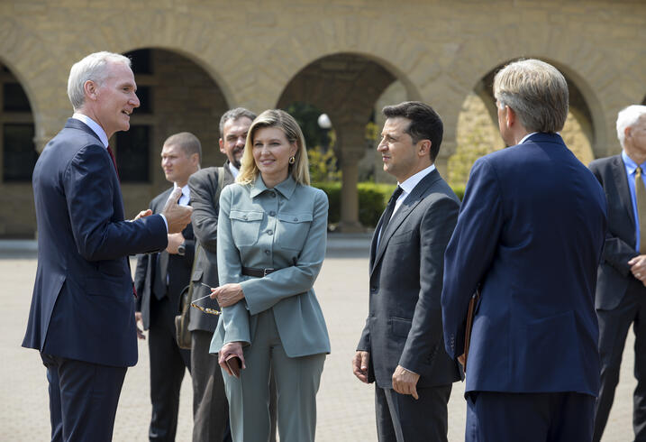 President Volodymyr Zelenskyy of Ukraine and First Lady Olena Zelenska meet with Stanford President Marc Tessier-Lavigne outside Stanford Memorial Church.