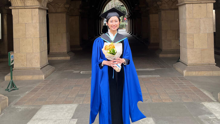 a person in gown with flowers