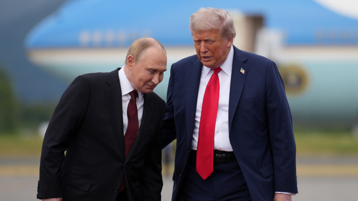 Vladimir Putin and Donald Trump in conversation on the tarmac of the Joint Base Elmendorf-Richardson on August 15, 2025 in Anchorage, Alaska.