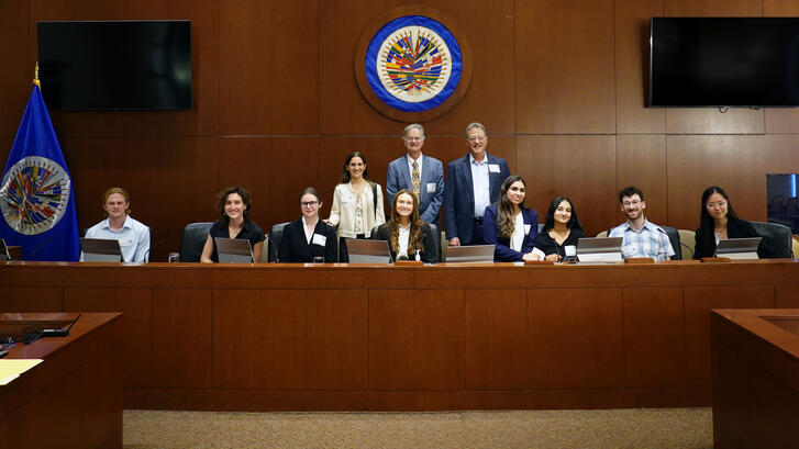 Members of the Fisher Family Honors Class of 2026 pose with faculty María Ignacia Curiel, Stephen Stedman, and Larry Diamond at the Organization of American States in Washington, D.C.