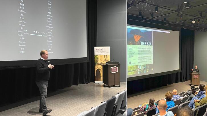 Steven Schwankert on a theater stage at a screening and discussion of the documentary 'The Six.'