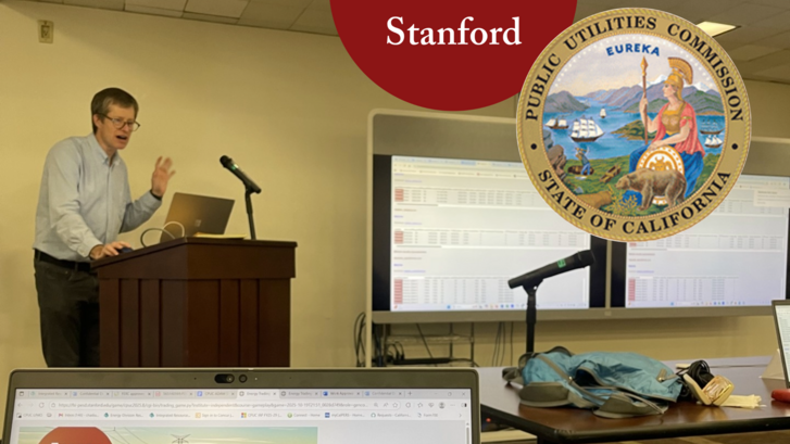 Mark Thurber teaching with Energy Market Game computer screen in foreground